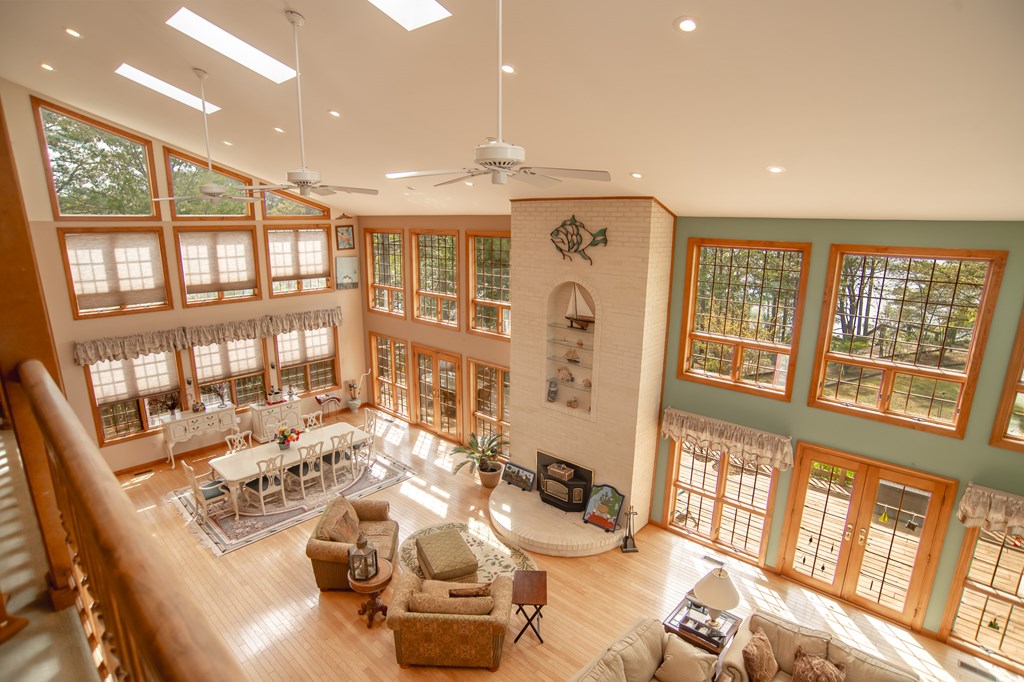 13581 Solitude Trail Machipongo, VA 23405 - Photo 5 of 51 a very nice looking living room with a large window and couches