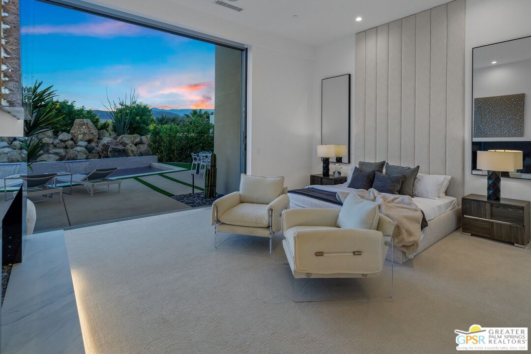 11 Sterling Ridge Drive Rancho Mirage, CA 92270 - Photo 11 of 33 a living room with furniture and a large window