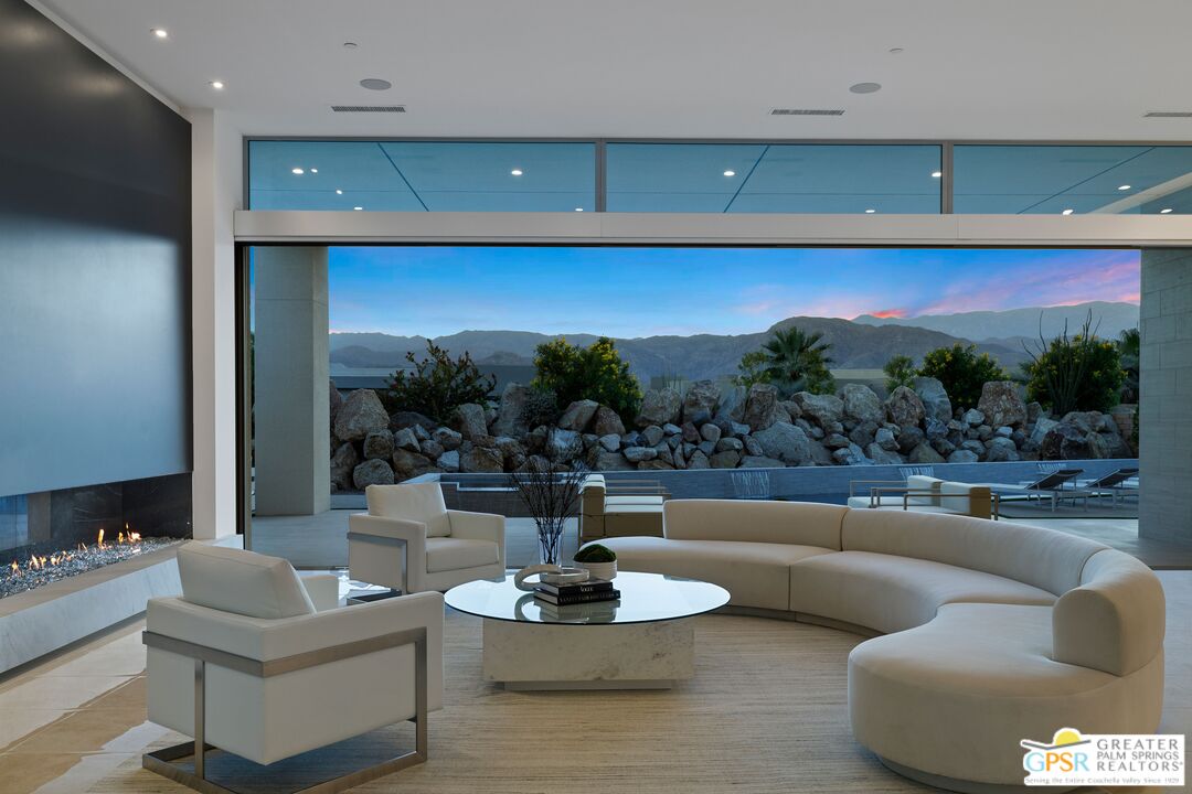 11 Sterling Ridge Drive Rancho Mirage, CA 92270 - Photo 2 of 33 a living room with furniture and a potted plant