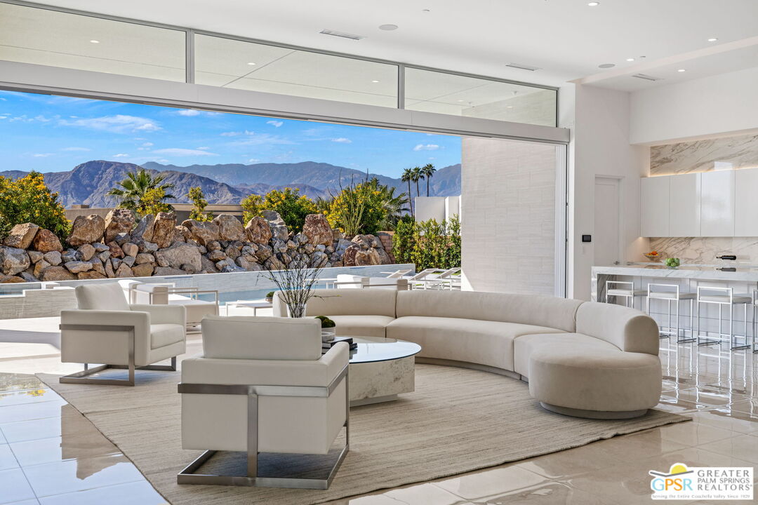 11 Sterling Ridge Drive Rancho Mirage, CA 92270 - Photo 21 of 33 a living room with furniture and a large window