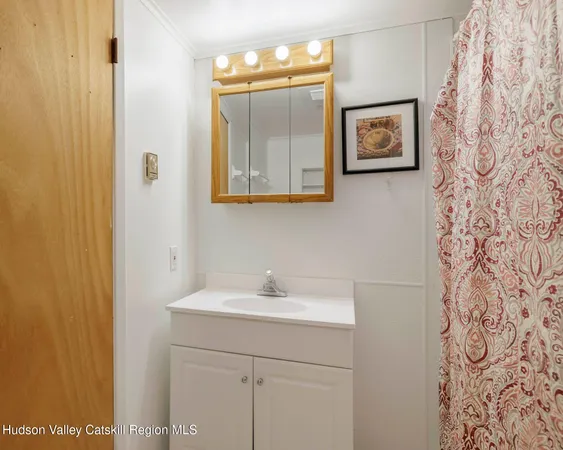 a view of a house with backyard porch and sitting area