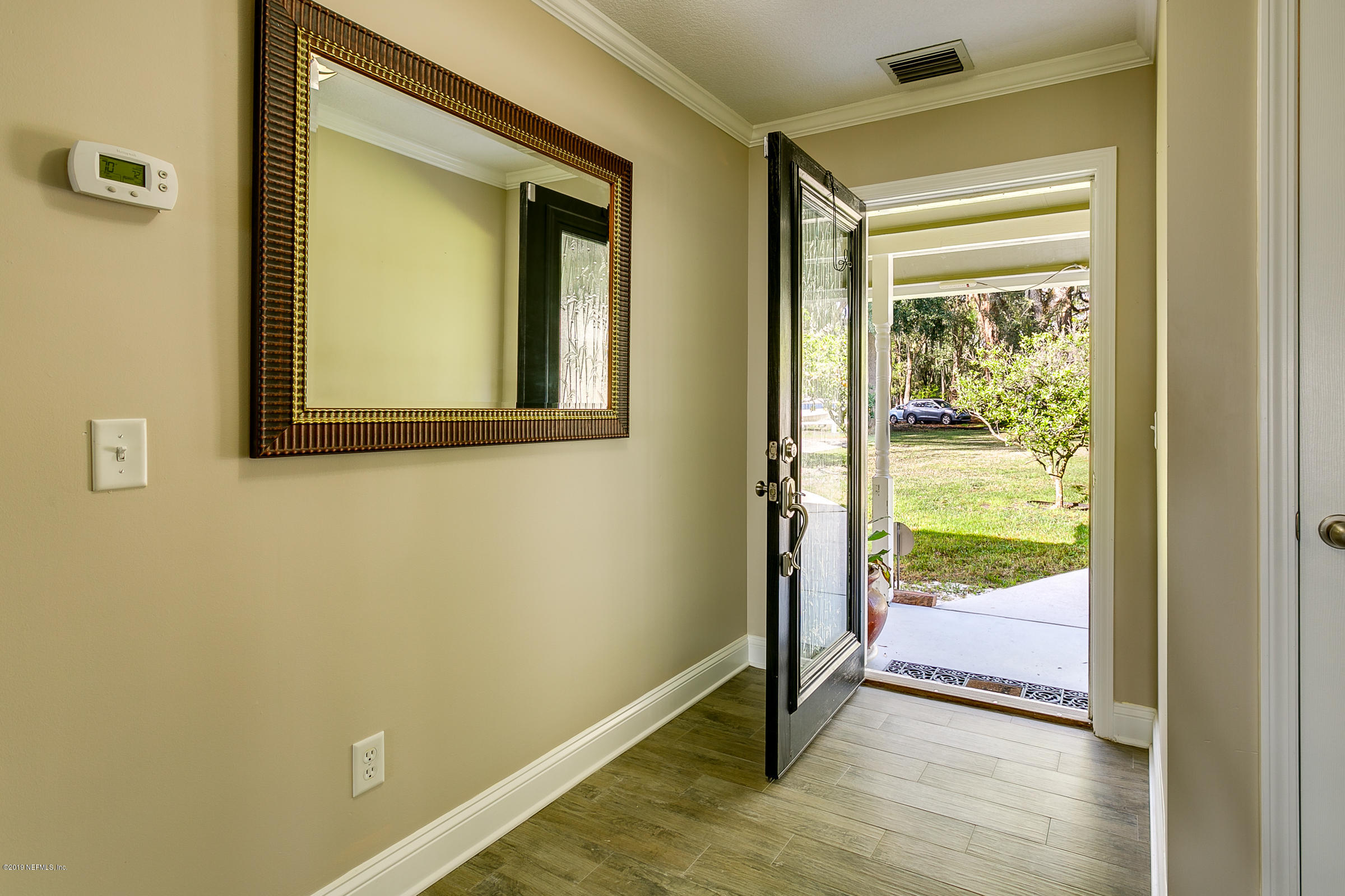156 North Ridge Drive Fleming Island, FL 32003 - Photo 5 of 59 04 Entry Foyer