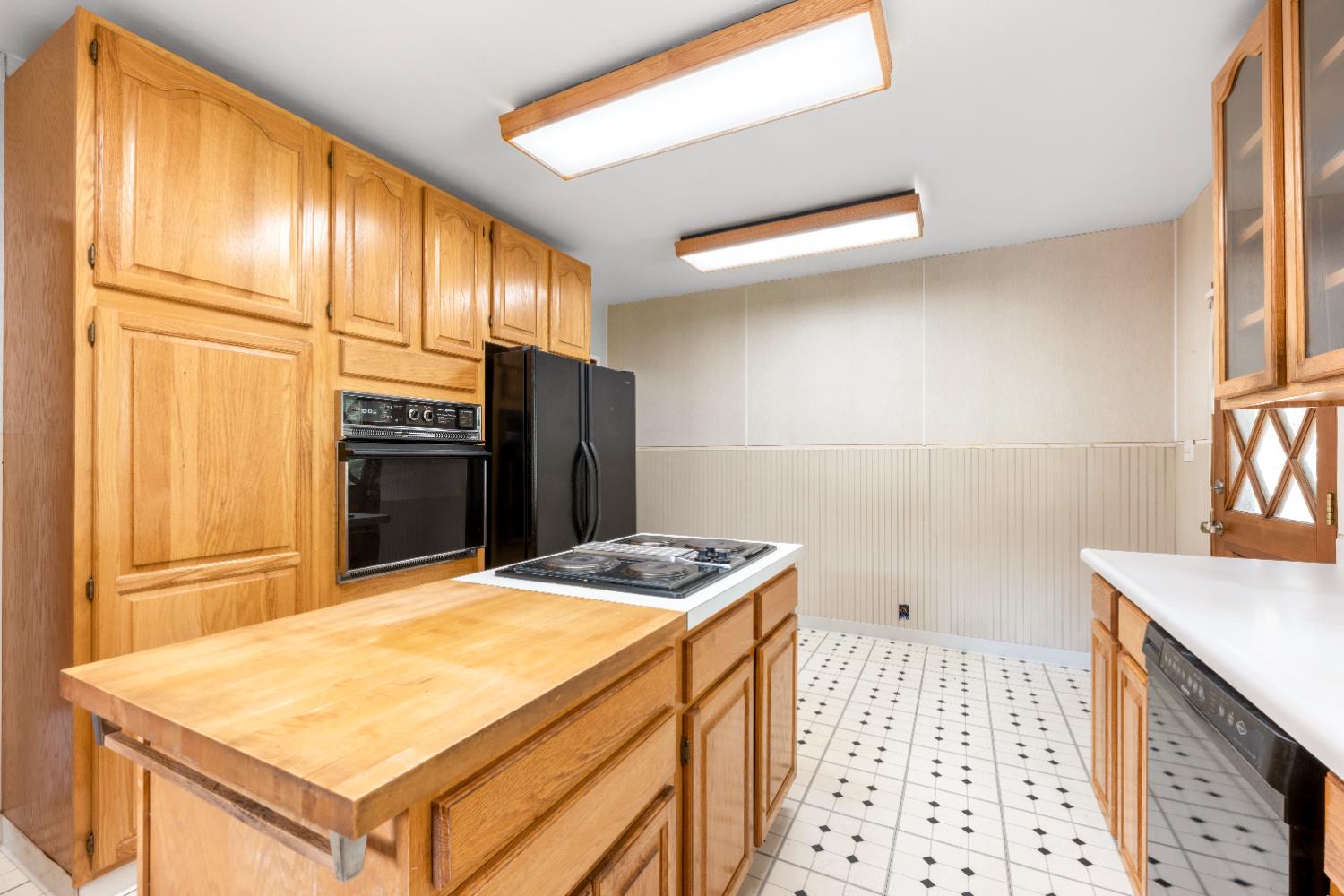 7321 Morning Canyon Road Placerville, CA 95667 - Photo 13 of 39 a kitchen with a refrigerator and a sink