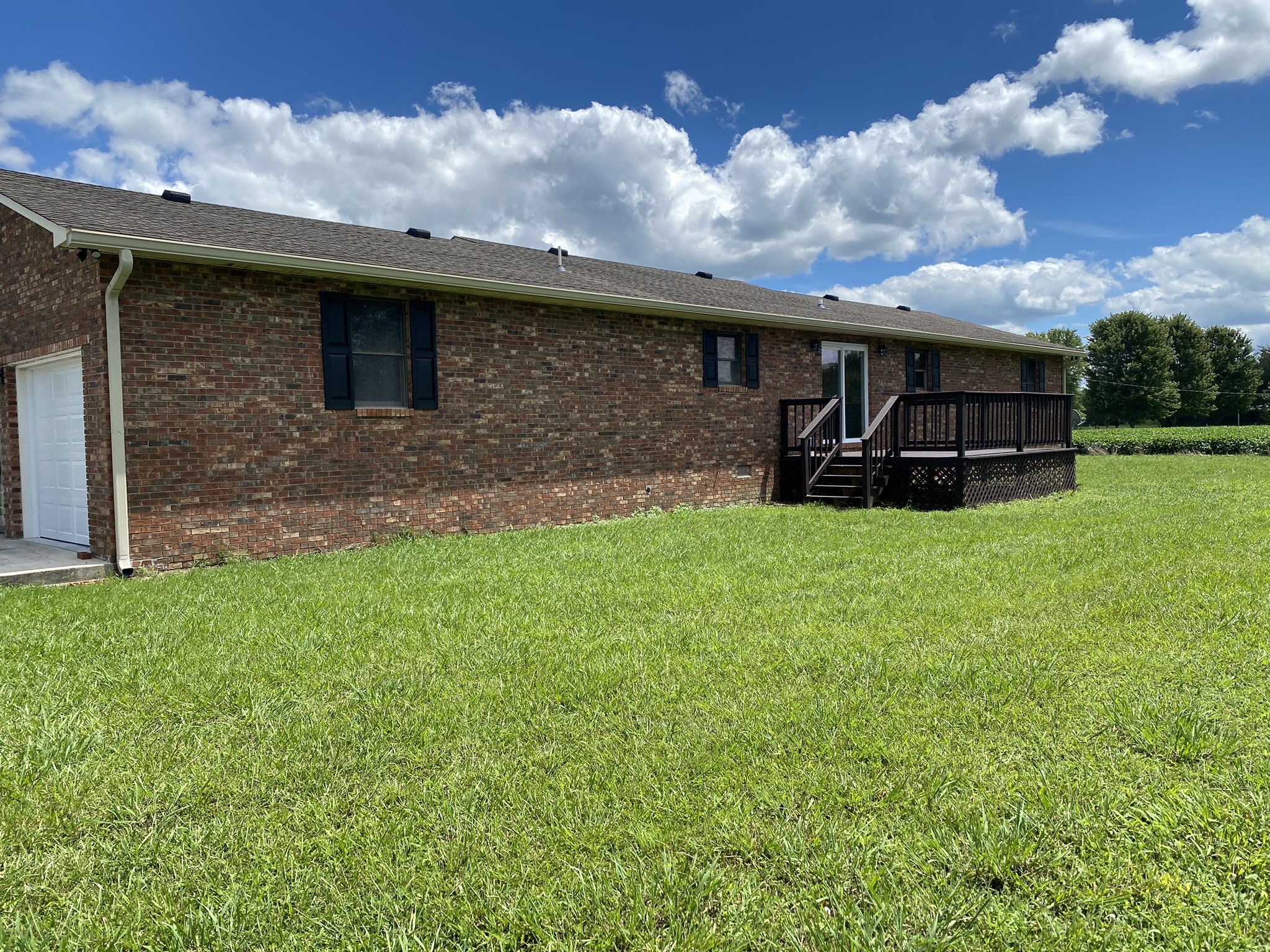 1239 Caney Branch Road Morrison, TN 37357 - Photo 17 of 19 a view of a house with a yard