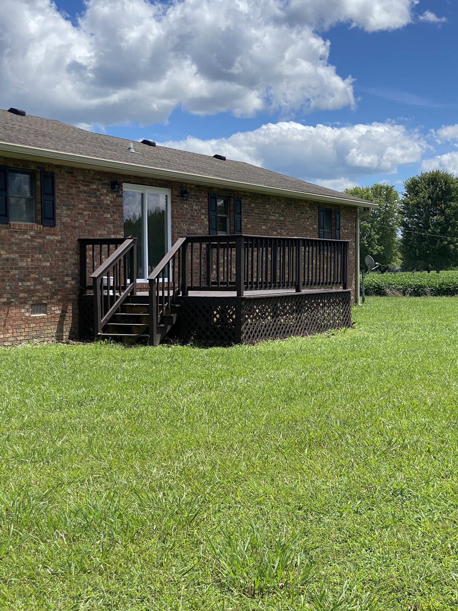 1239 Caney Branch Road Morrison, TN 37357 - Photo 19 of 19 a view of house with yard and outdoor seating