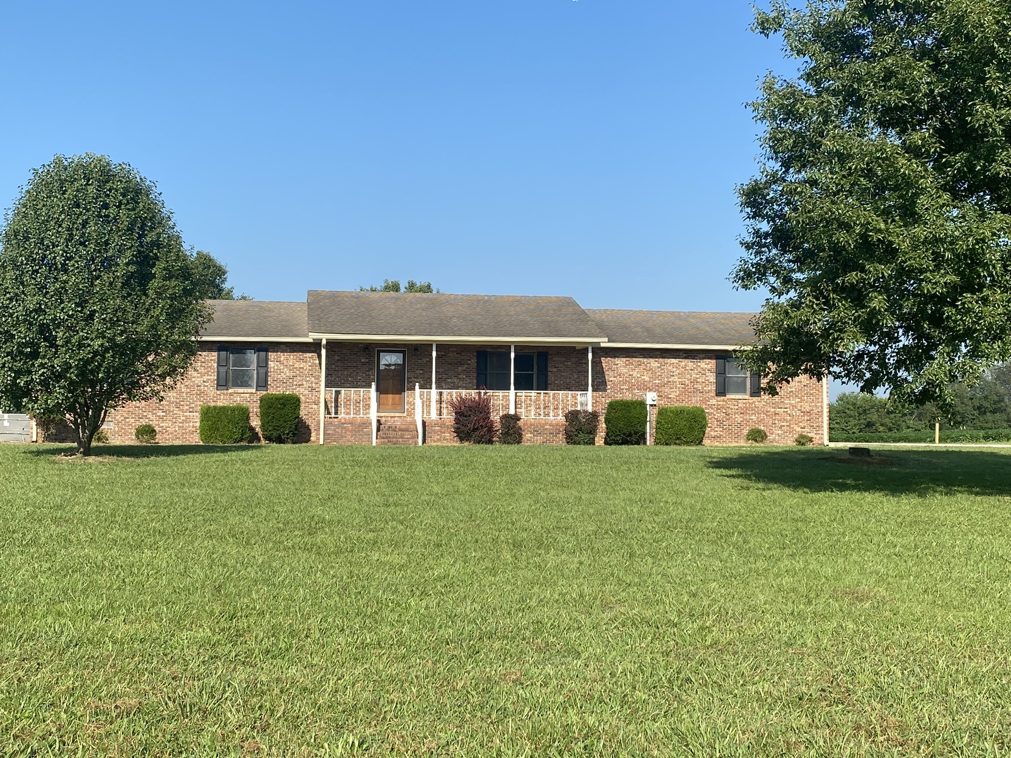1239 Caney Branch Road Morrison, TN 37357 - Photo 2 of 19 a front view of a house with a yard
