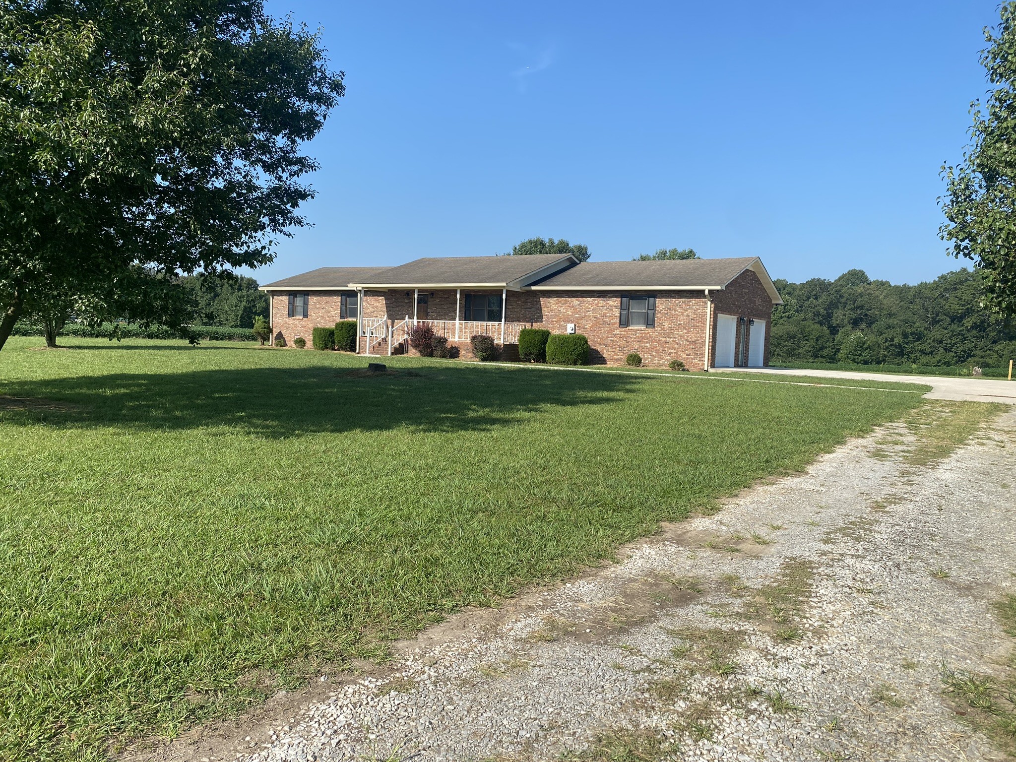 1239 Caney Branch Road Morrison, TN 37357 - Photo 3 of 19 a front view of a house with a yard