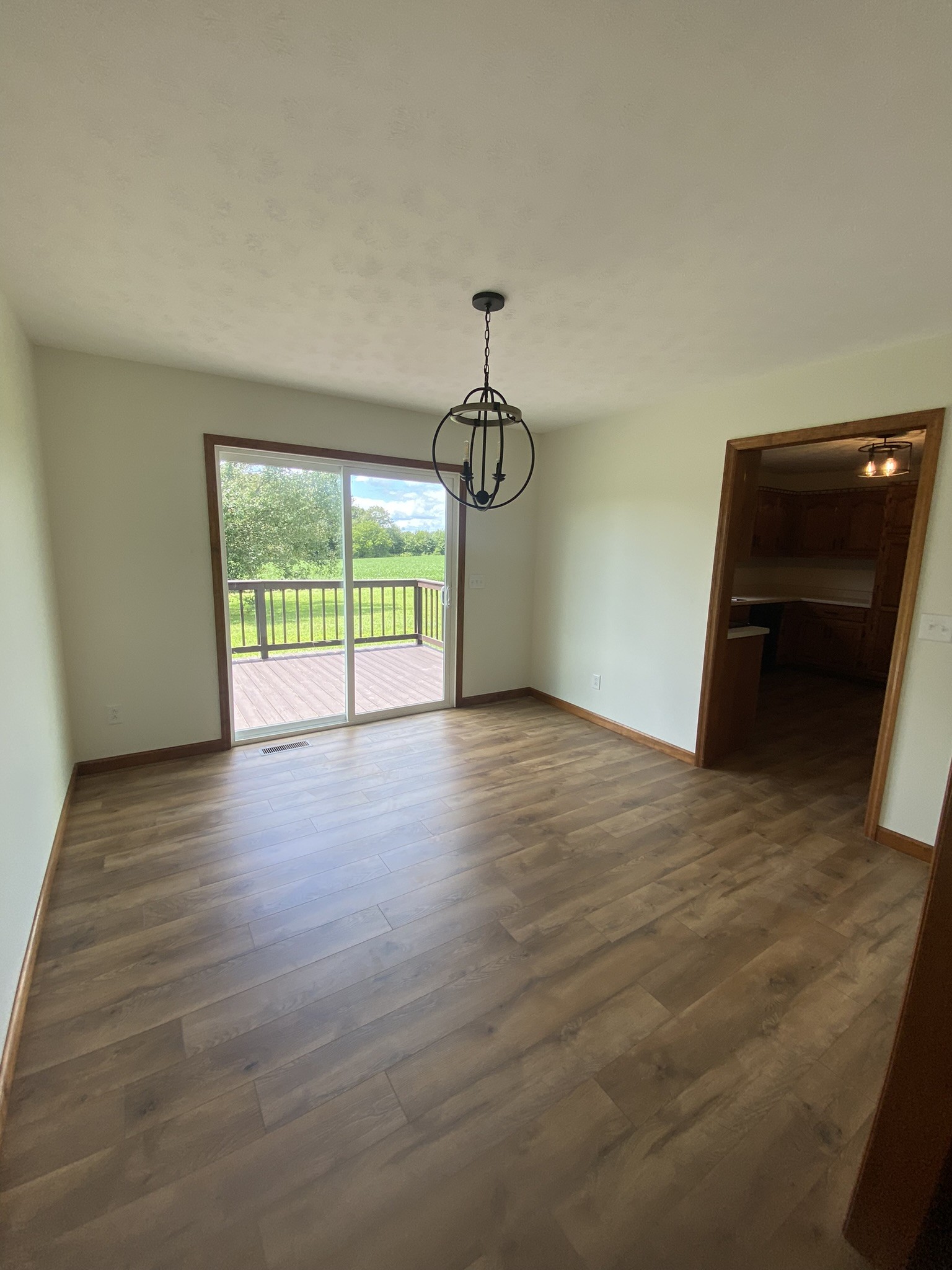 1239 Caney Branch Road Morrison, TN 37357 - Photo 5 of 19 a view of empty room with wooden floor and fan