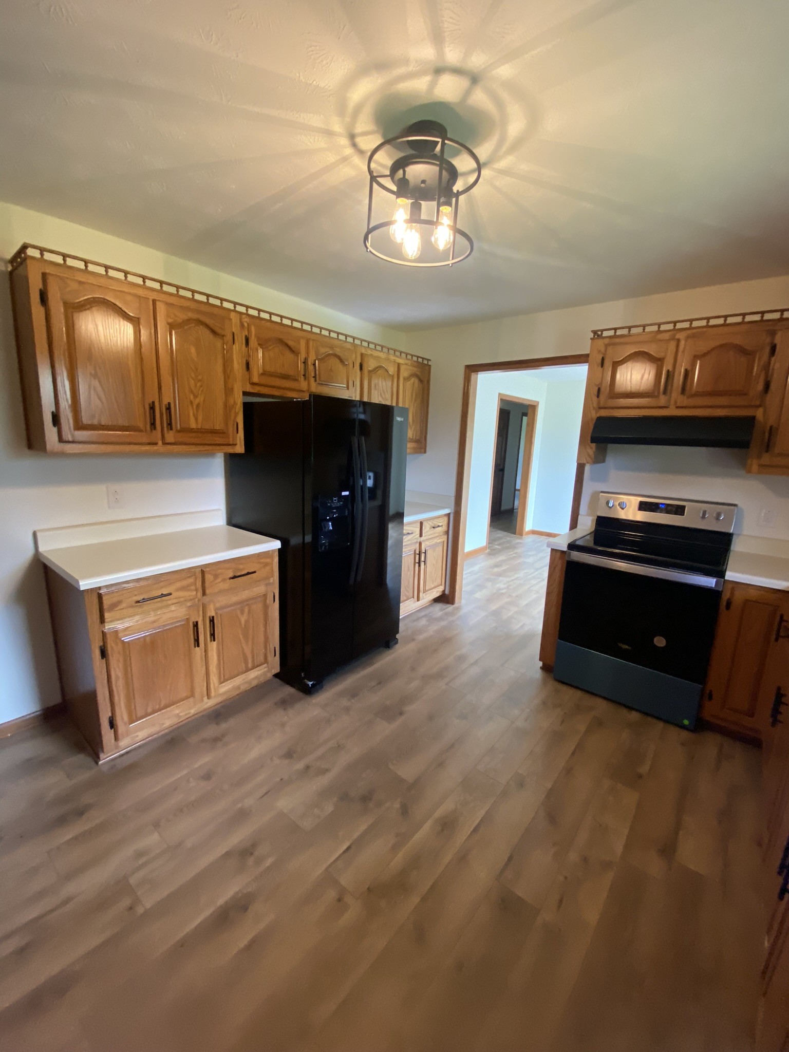 1239 Caney Branch Road Morrison, TN 37357 - Photo 6 of 19 a kitchen with stainless steel appliances granite countertop a stove and a sink