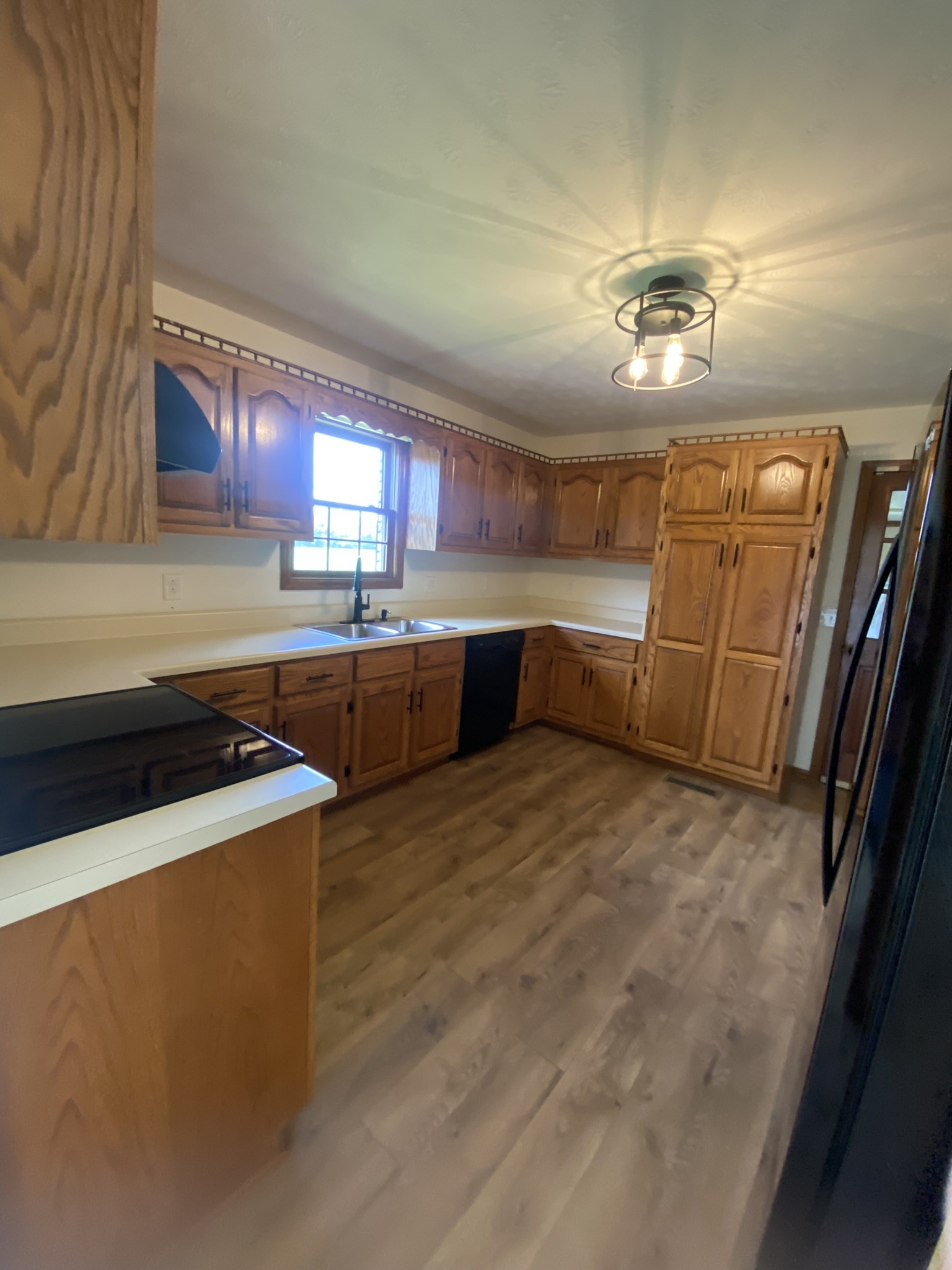 1239 Caney Branch Road Morrison, TN 37357 - Photo 7 of 19 a kitchen with stainless steel appliances granite countertop a sink and a stove