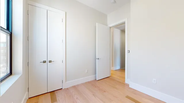 a bathroom with a toilet a sink and bathtub