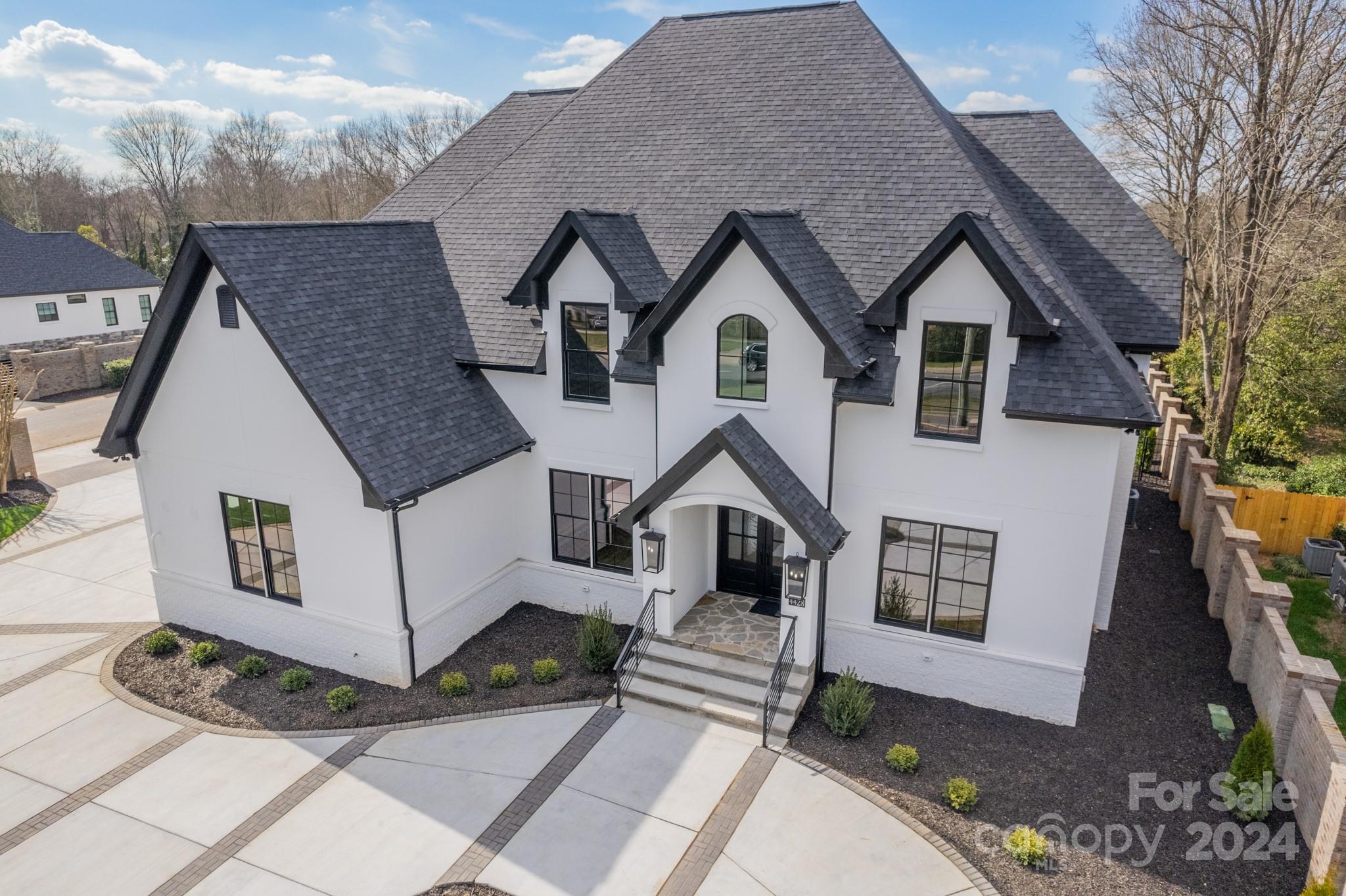 4428 Carmel Road Charlotte, NC 28226 - Photo 2 of 48 a view of house and street