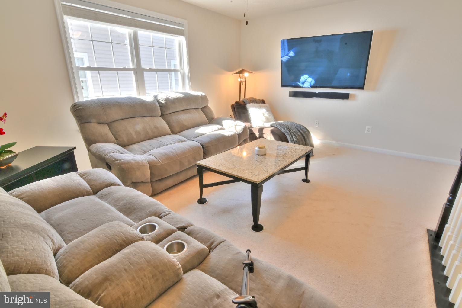 13170 Triple Crown Loop Gainesville, VA 20155 - Photo 48 of 71 a living room with furniture and a window