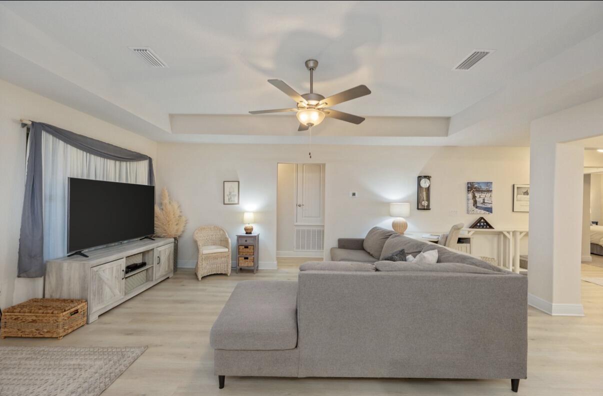 2191 Jernigan Drive Crestview, FL 32536 - Photo 17 of 42 a living room with furniture and a flat screen tv