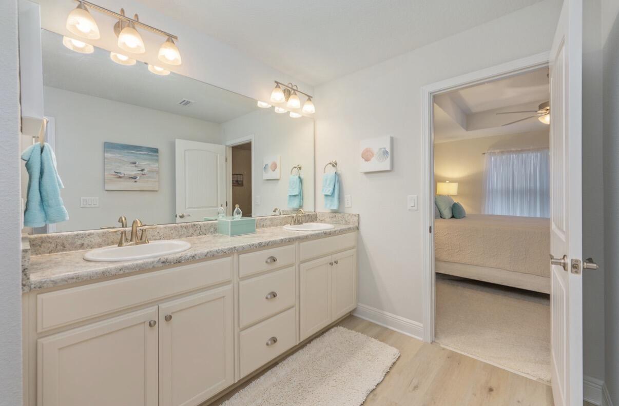 2191 Jernigan Drive Crestview, FL 32536 - Photo 22 of 42 a en suite bathroom with double sink and a mirror