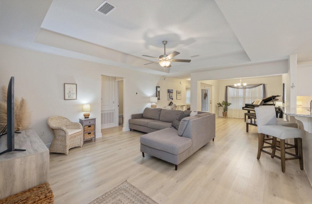 2191 Jernigan Drive Crestview, FL 32536 - Photo 6 of 42 a living room with furniture and a flat screen tv