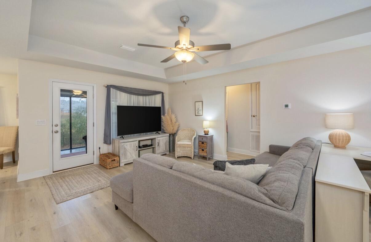 2191 Jernigan Drive Crestview, FL 32536 - Photo 10 of 42 a living room with furniture and a flat screen tv