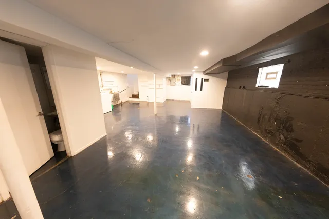 a view of a living room and dining room