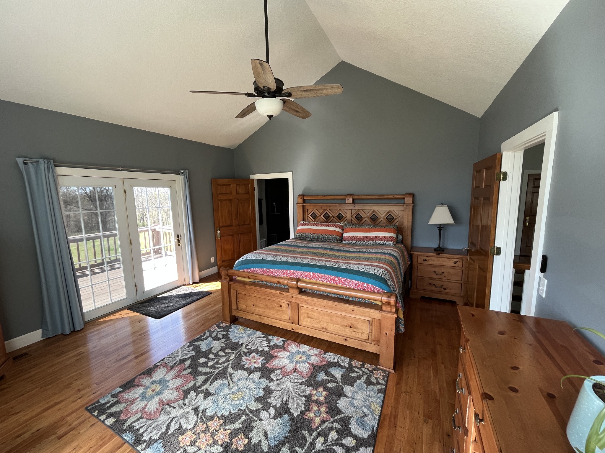 1282 East Roarks Cove Road Decherd, TN 37324 - Photo 11 of 24 a bedroom with a bed and wooden floor