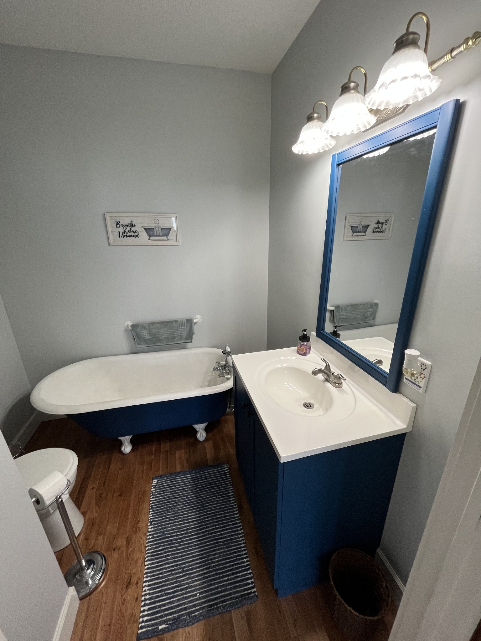 1282 East Roarks Cove Road Decherd, TN 37324 - Photo 16 of 24 a bathroom with a sink and a mirror
