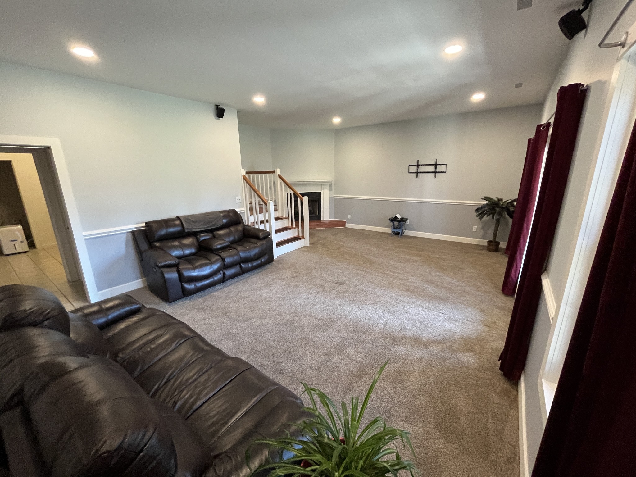 1282 East Roarks Cove Road Decherd, TN 37324 - Photo 17 of 24 a living room with furniture and a flat screen tv