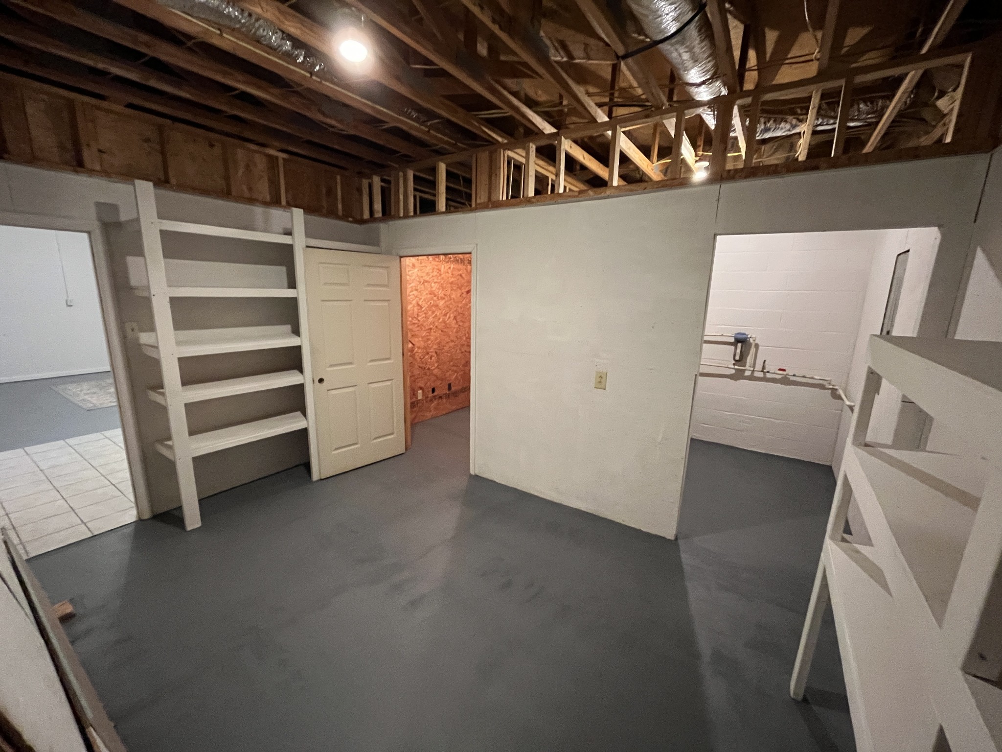 1282 East Roarks Cove Road Decherd, TN 37324 - Photo 20 of 24 a view of walk in closet with empty racks
