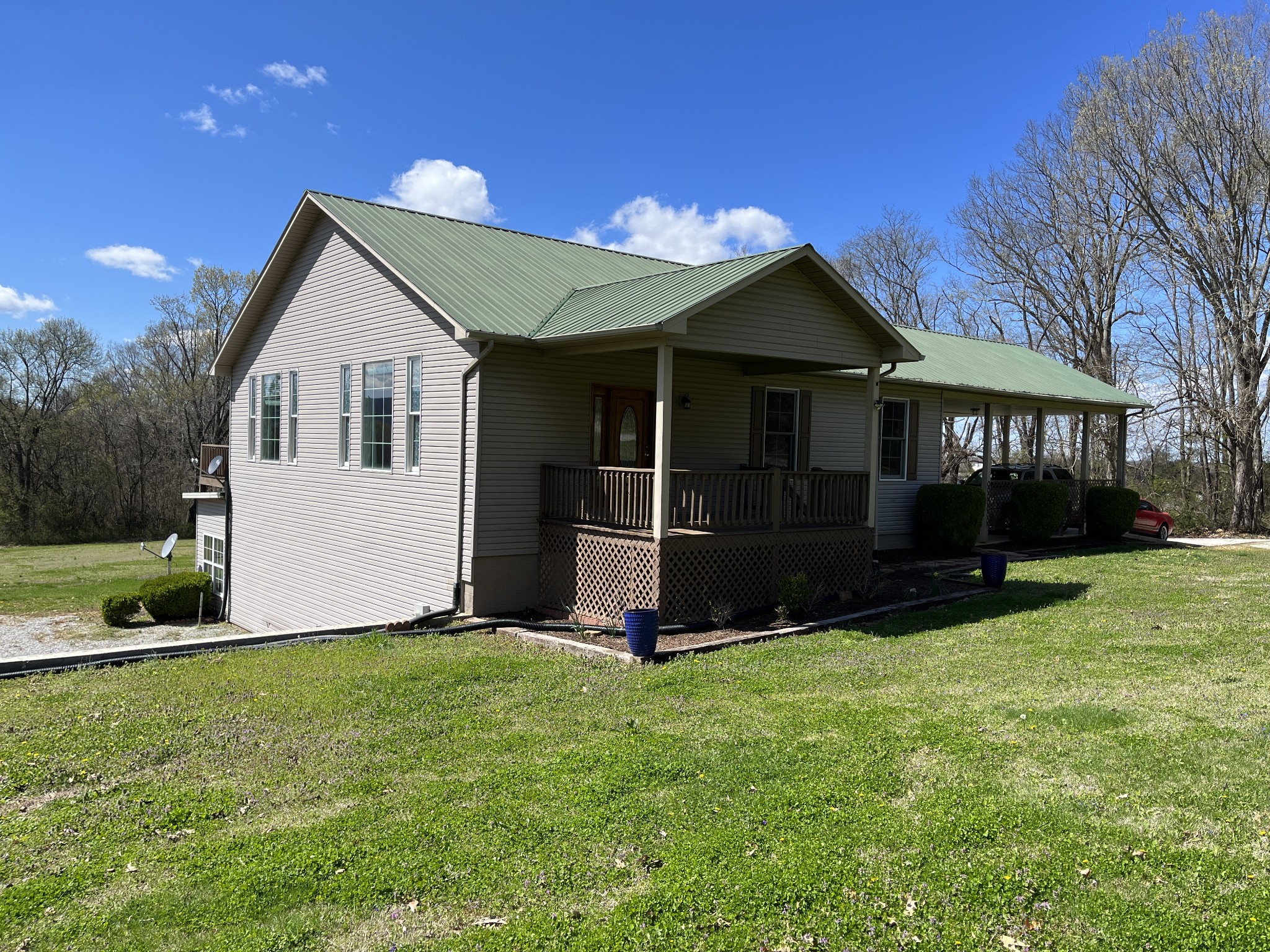 1282 East Roarks Cove Road Decherd, TN 37324 - Photo 3 of 24 a front view of house with yard and green space