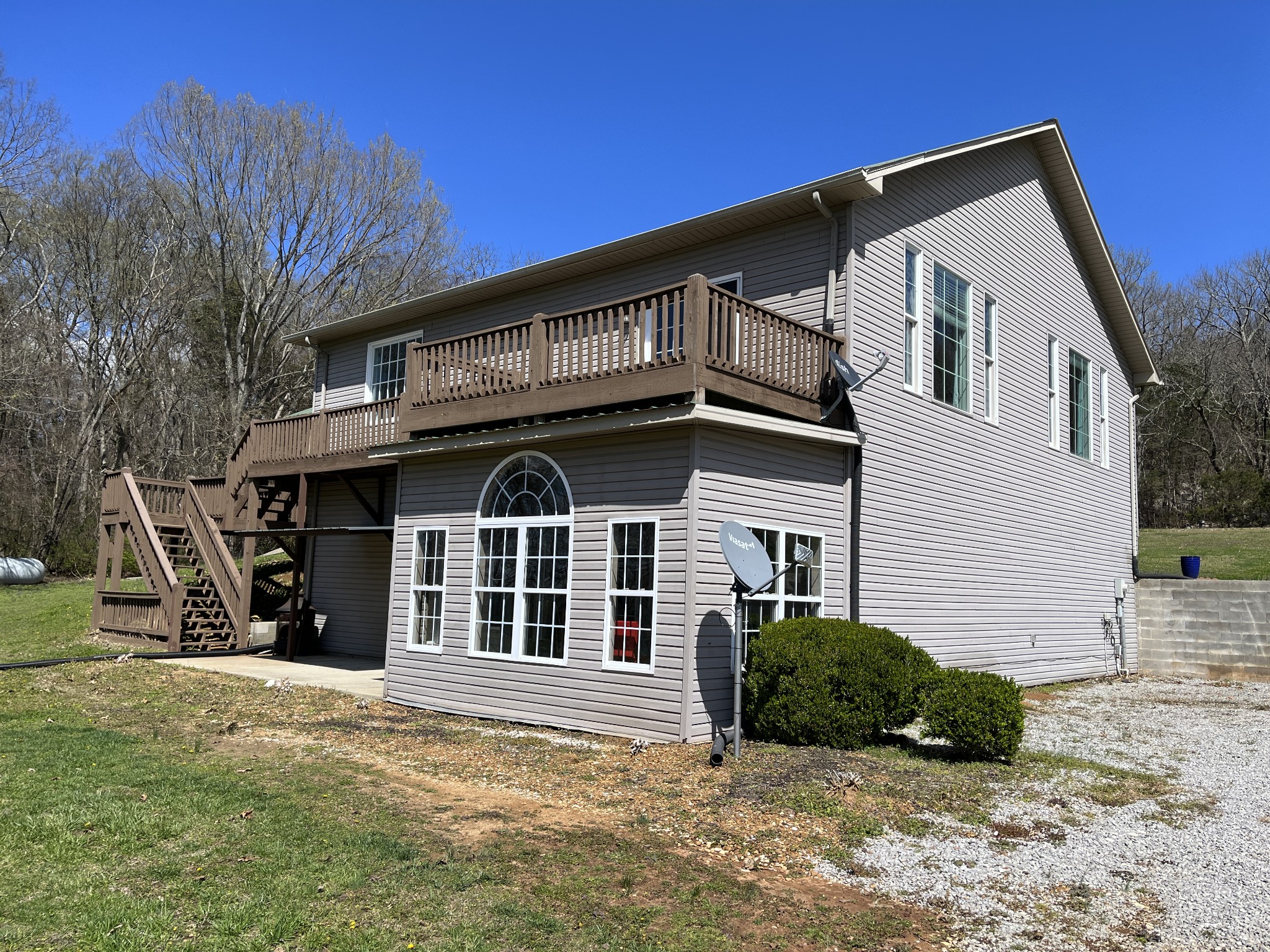 1282 East Roarks Cove Road Decherd, TN 37324 - Photo 4 of 24 a view of a house with a yard