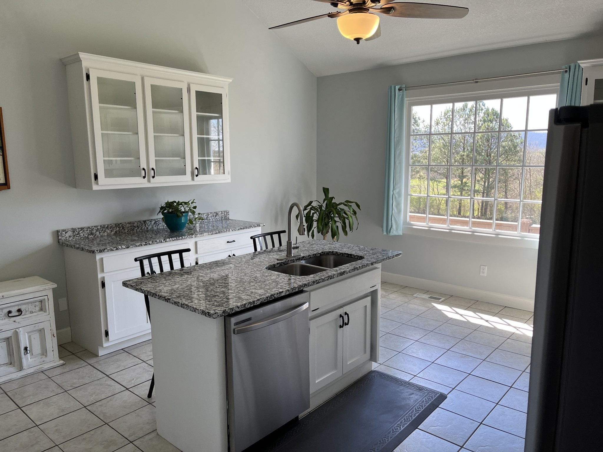 1282 East Roarks Cove Road Decherd, TN 37324 - Photo 8 of 24 a kitchen with granite countertop a sink and a stove