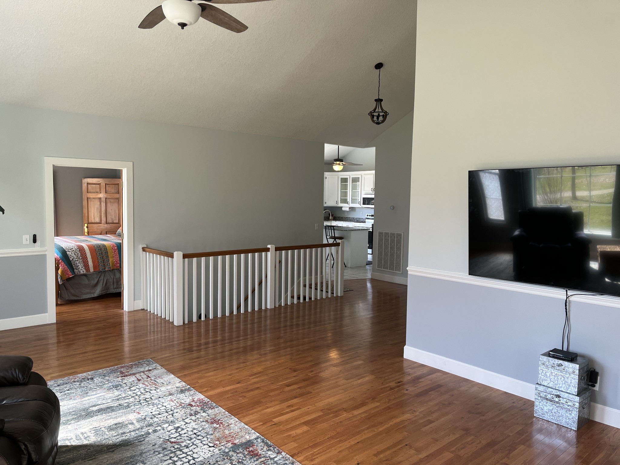 1282 East Roarks Cove Road Decherd, TN 37324 - Photo 10 of 24 a living room with furniture and a flat screen tv