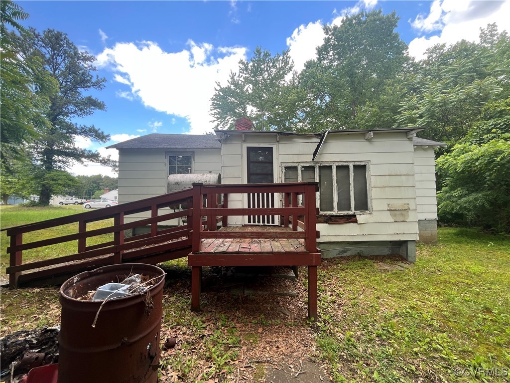 4310 Mt Sinai Road Prince George, VA 23875 - Photo 2 of 5 Back of property featuring a wooden deck, a chimne