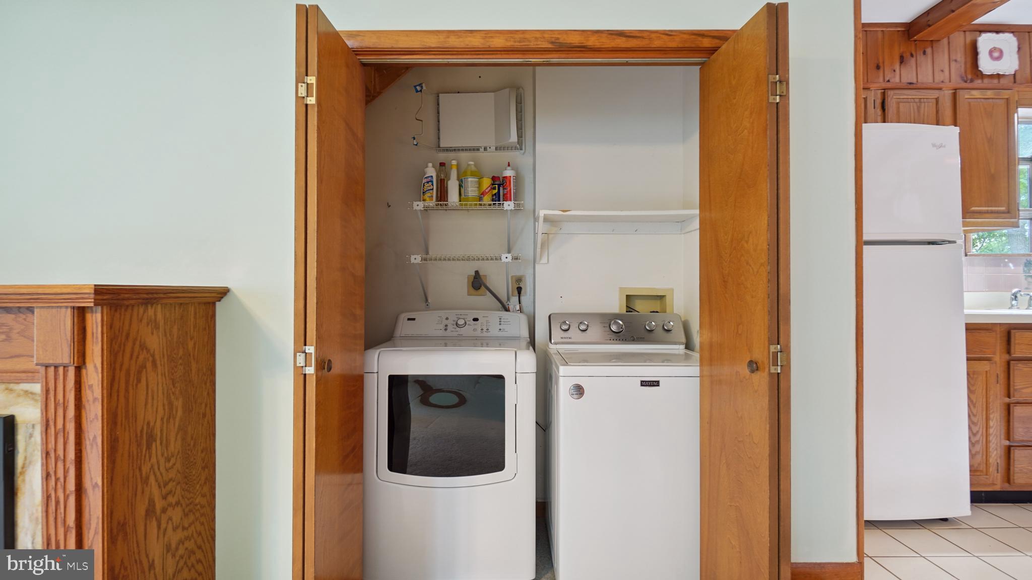 1718 Quantico Road Edgewater, MD 21037 - Photo 22 of 54 a utility room with dryer and washer