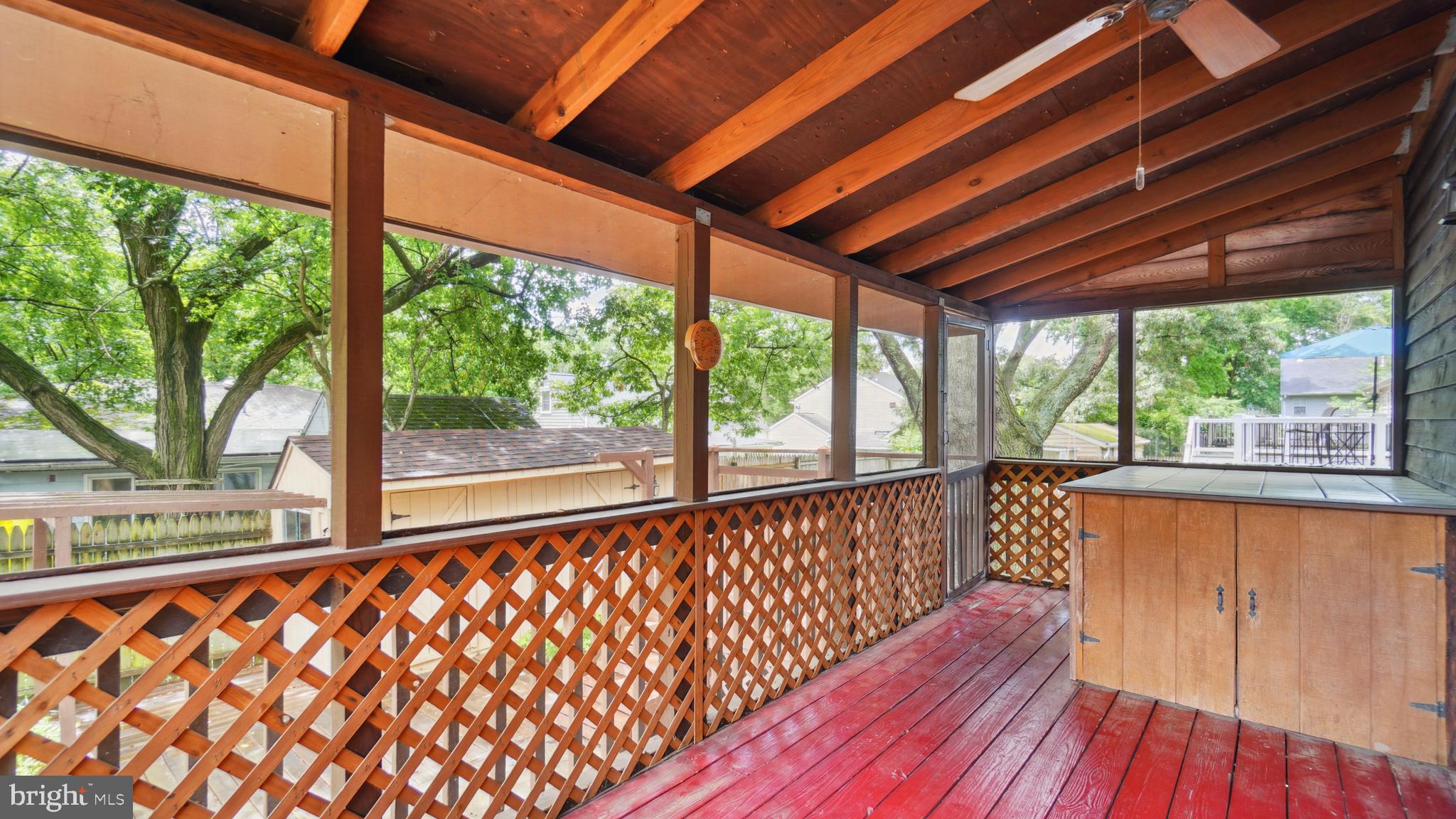 1718 Quantico Road Edgewater, MD 21037 - Photo 23 of 54 a view of porch with wooden floor