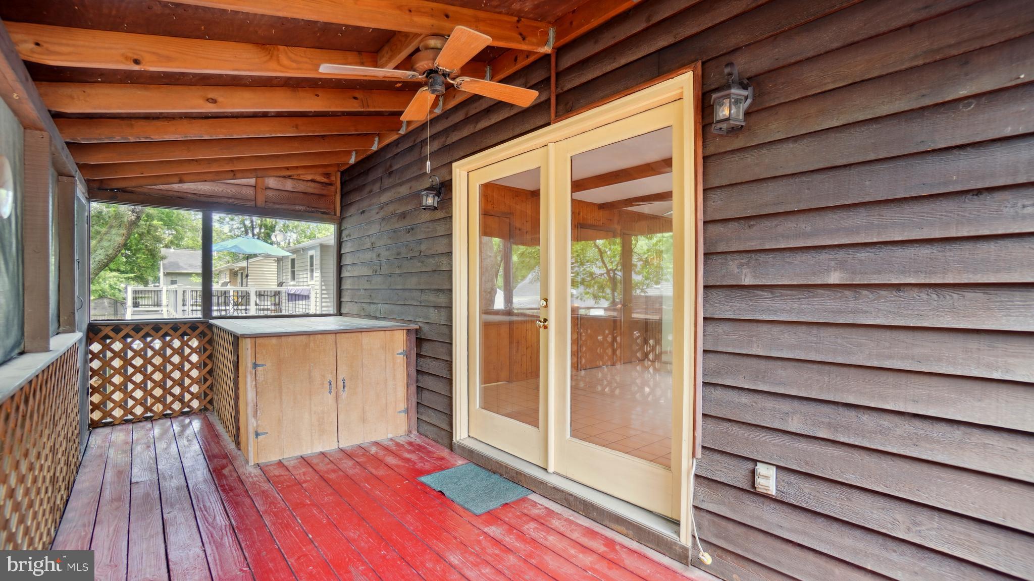 1718 Quantico Road Edgewater, MD 21037 - Photo 24 of 54 a view of outdoor space with deck and wooden floor