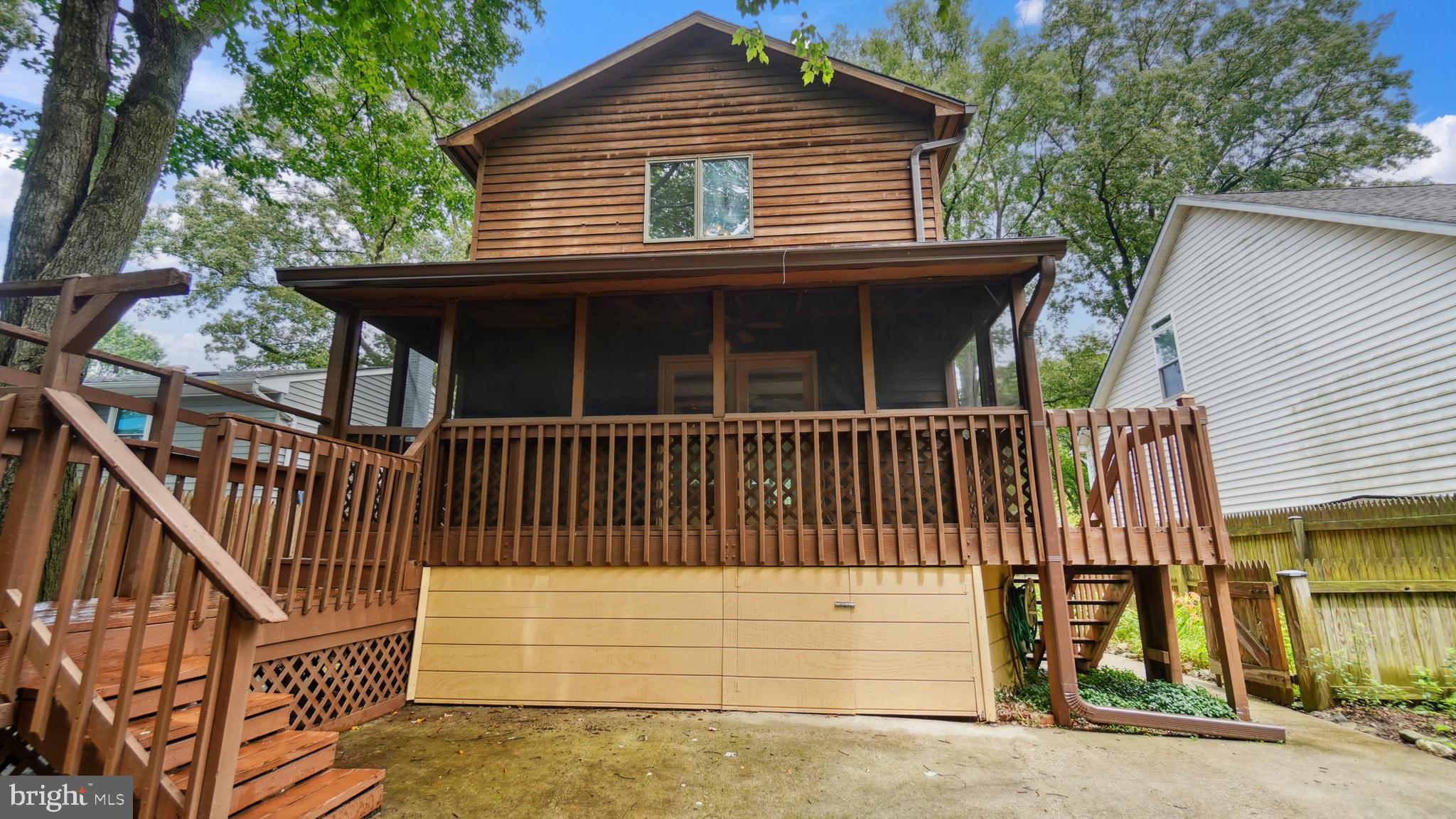 1718 Quantico Road Edgewater, MD 21037 - Photo 52 of 54 a view of house with a deck