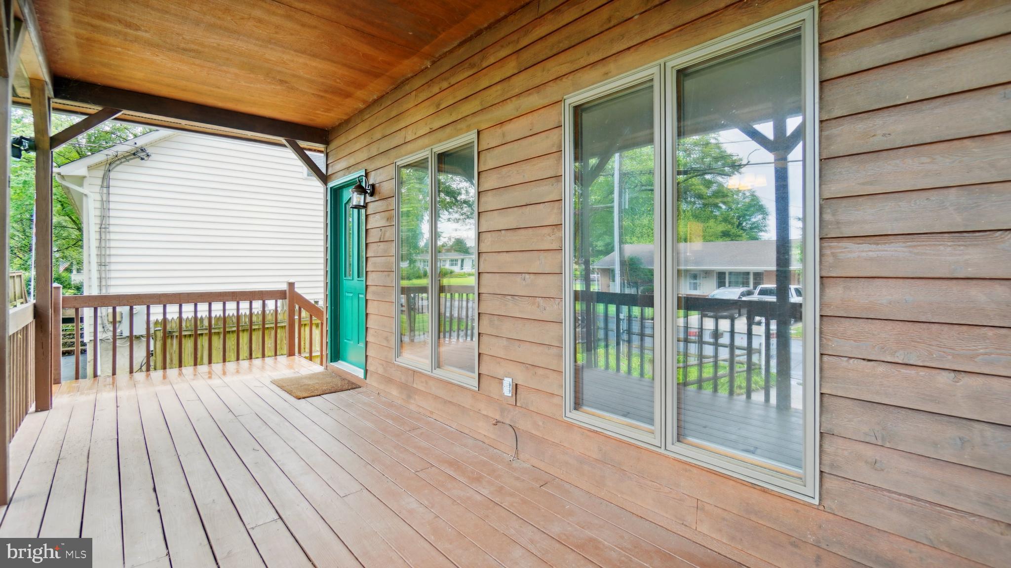 1718 Quantico Road Edgewater, MD 21037 - Photo 6 of 54 a view of a house with a deck