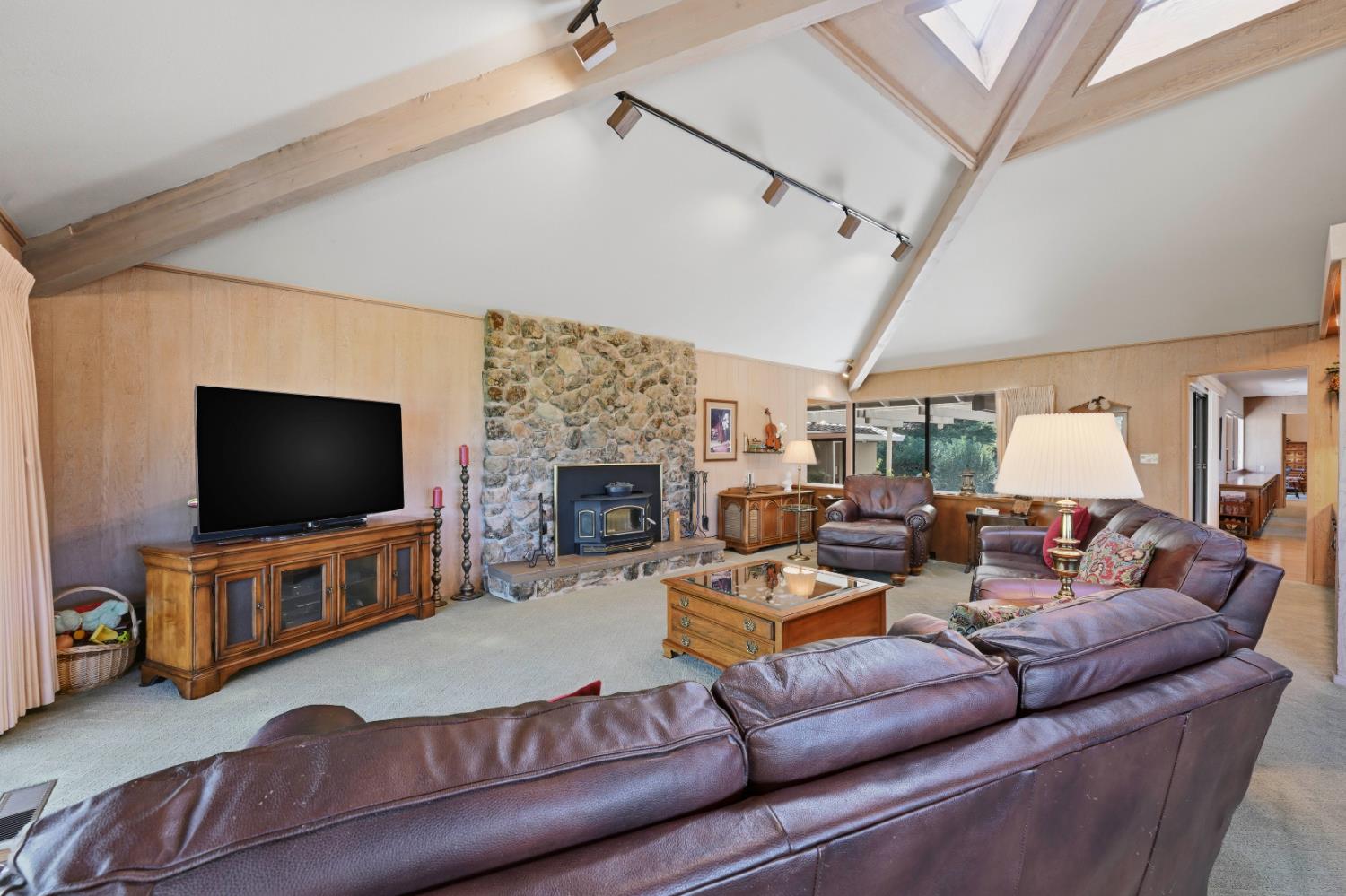 8860 Auburn Valley Road Auburn, CA 95602 - Photo 14 of 46 a living room with furniture and a flat screen tv