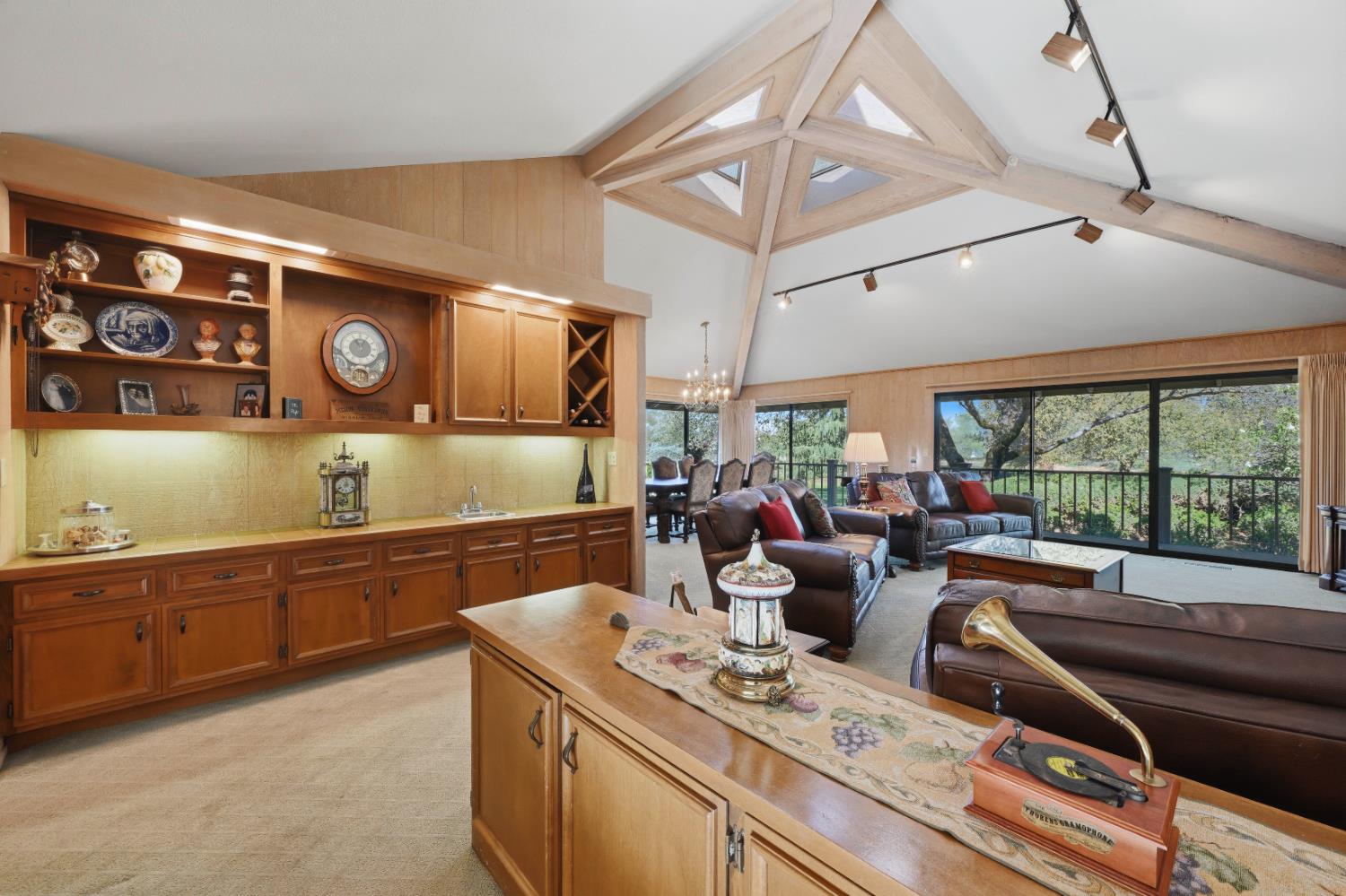 8860 Auburn Valley Road Auburn, CA 95602 - Photo 15 of 46 a kitchen with stainless steel appliances kitchen island granite countertop a sink and cabinets