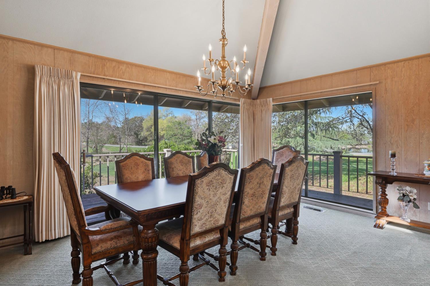 8860 Auburn Valley Road Auburn, CA 95602 - Photo 17 of 46 a view of a dining room with furniture window and outside view