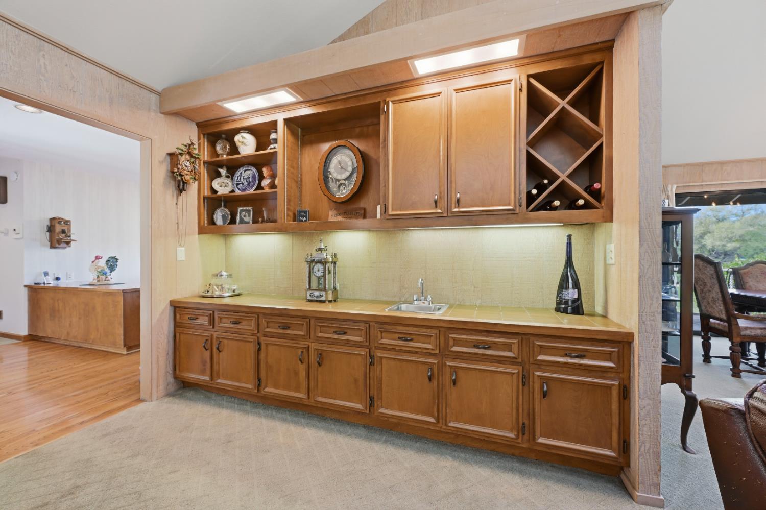 8860 Auburn Valley Road Auburn, CA 95602 - Photo 19 of 46 a utility room with a sink and cabinets