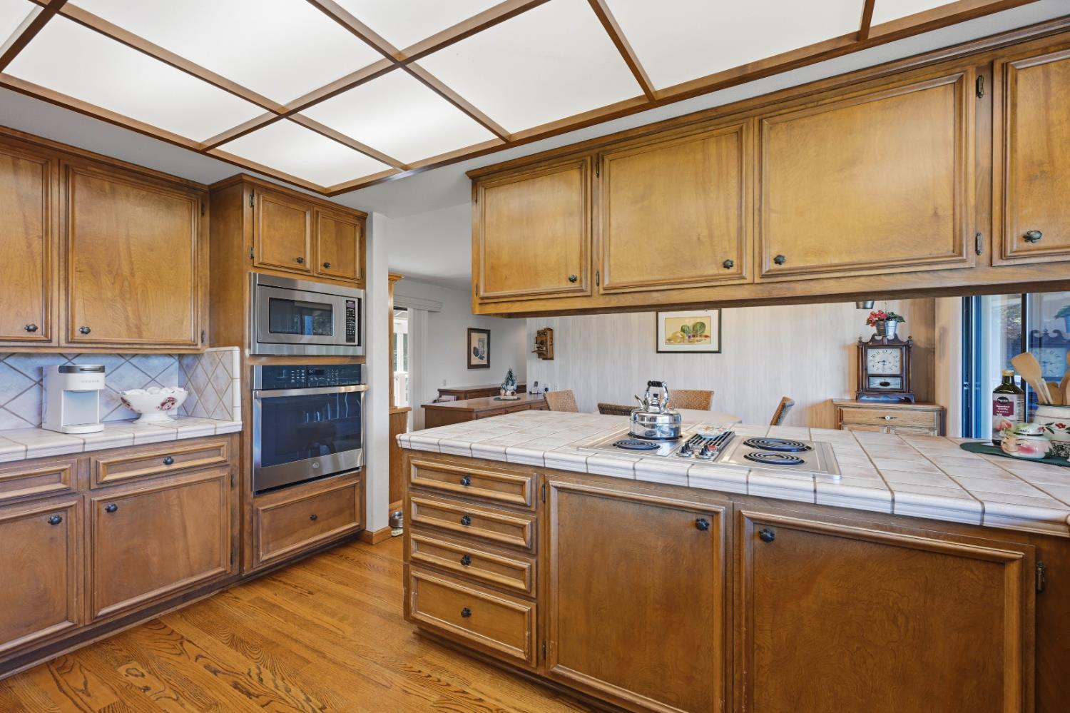 8860 Auburn Valley Road Auburn, CA 95602 - Photo 21 of 46 a kitchen with stainless steel appliances granite countertop a sink and cabinets