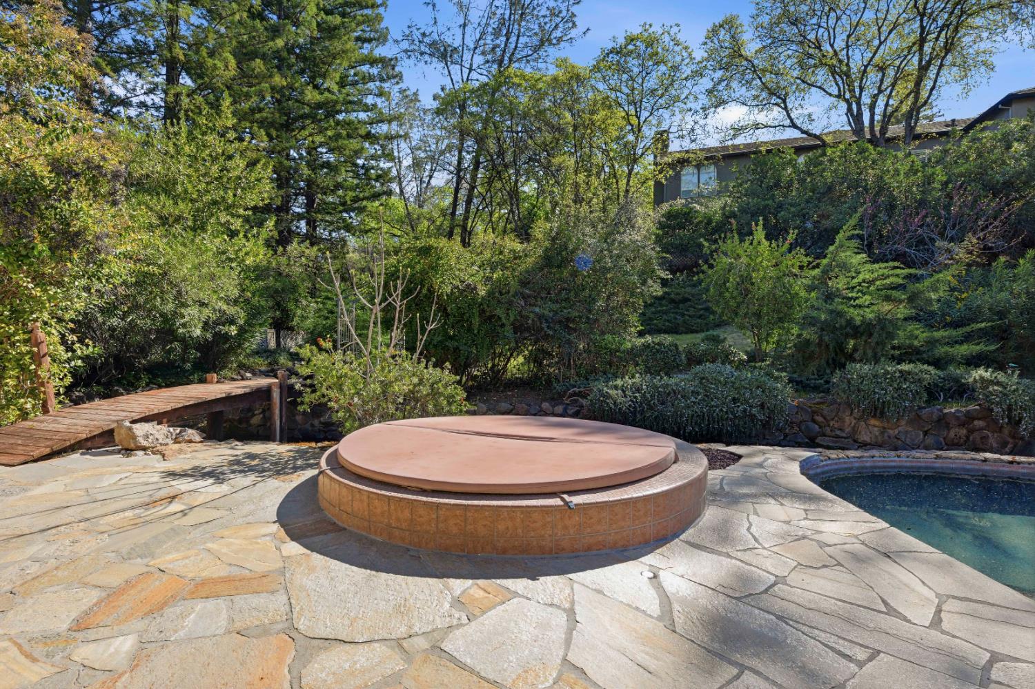 8860 Auburn Valley Road Auburn, CA 95602 - Photo 35 of 46 a view of a swimming pool with a patio