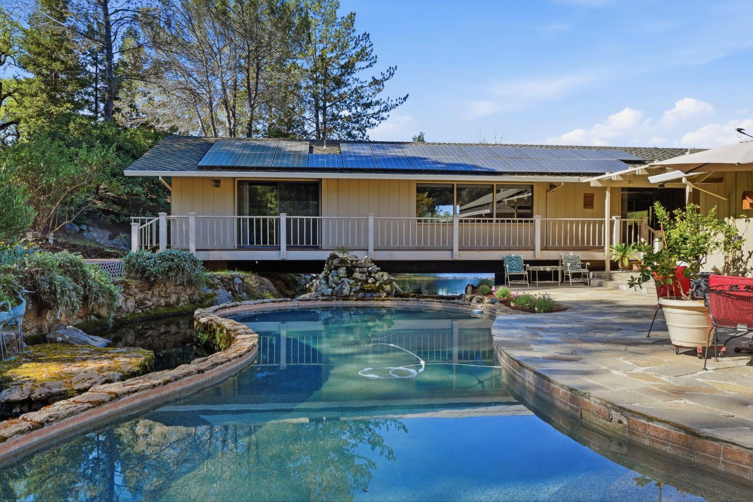8860 Auburn Valley Road Auburn, CA 95602 - Photo 36 of 46 a front view of a house with garden