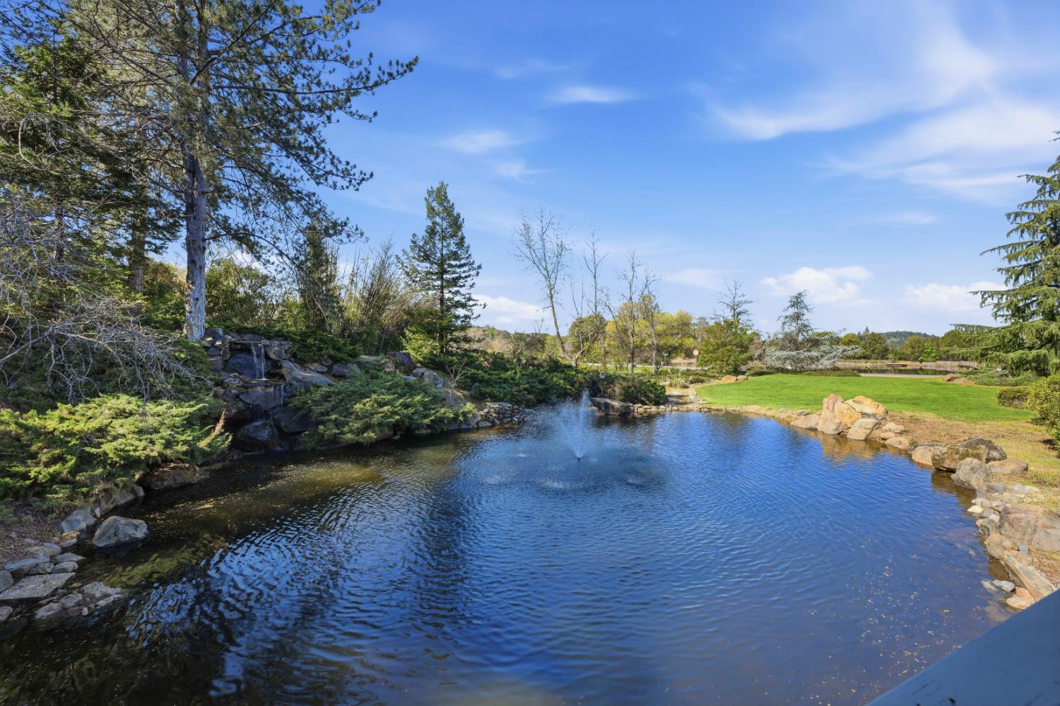 8860 Auburn Valley Road Auburn, CA 95602 - Photo 38 of 46 a view of a lake with houses in the back
