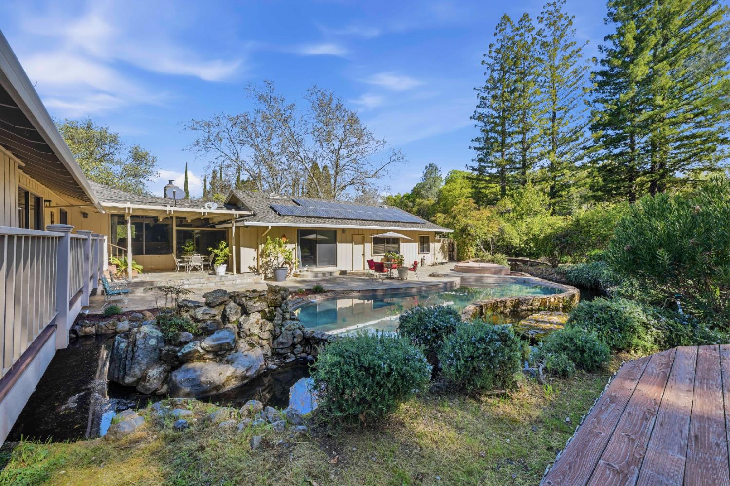 8860 Auburn Valley Road Auburn, CA 95602 - Photo 39 of 46 a front view of house with yard and trees around