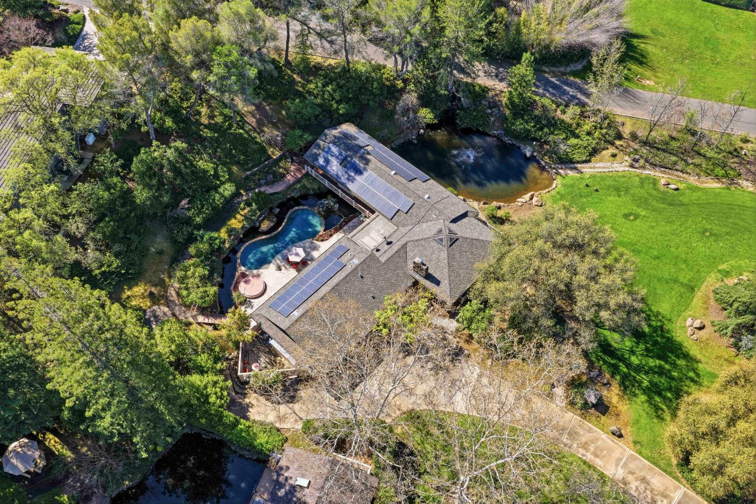8860 Auburn Valley Road Auburn, CA 95602 - Photo 44 of 46 an aerial view of a house with a yard