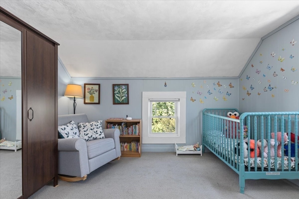 9 John Street Waltham, MA 02453 - Photo 34 of 43 a bedroom with furniture and a window