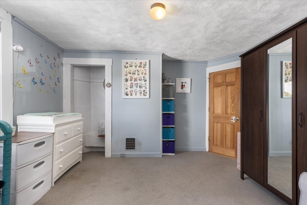 9 John Street Waltham, MA 02453 - Photo 35 of 43 a view of cabinets and window