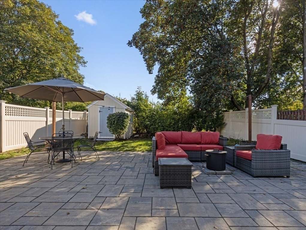 9 John Street Waltham, MA 02453 - Photo 39 of 43 a view of a sitting area with furniture and a table