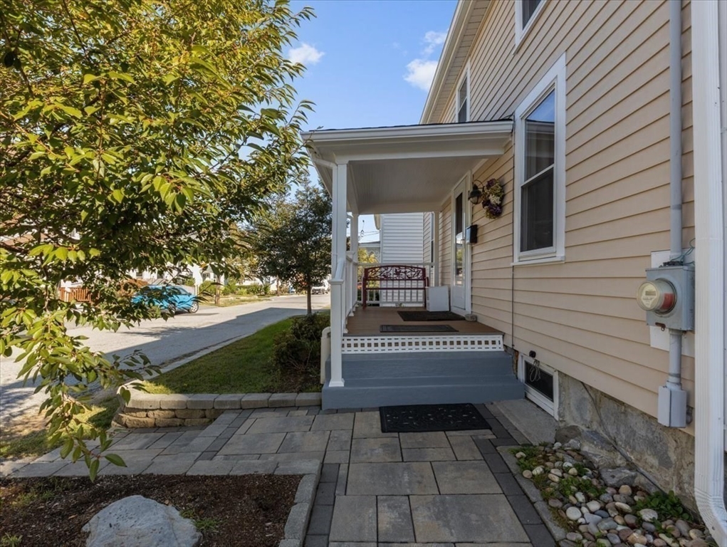 9 John Street Waltham, MA 02453 - Photo 5 of 43 a view of a bench in the house